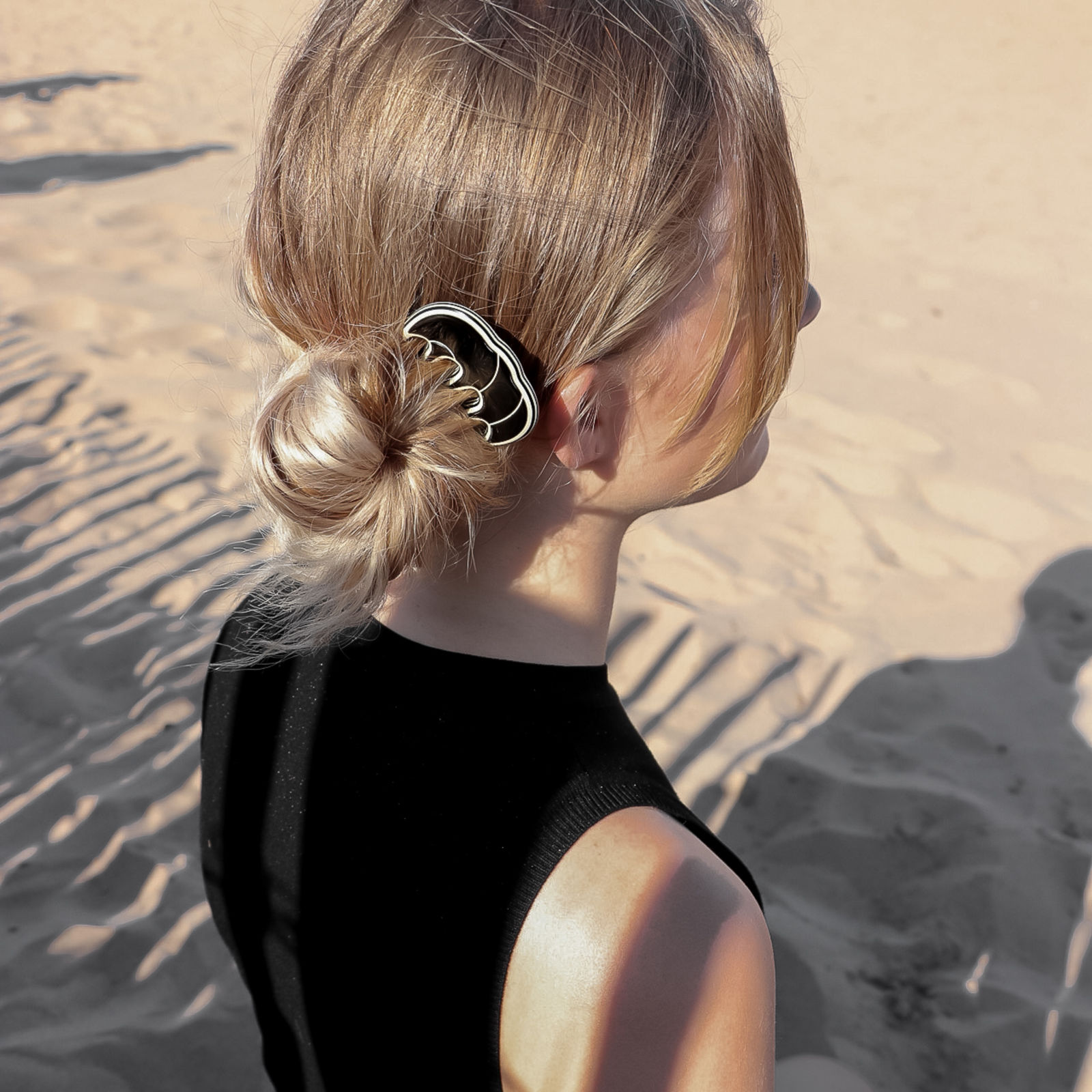 Folded ponytail with clip, loop trendy hairstyle